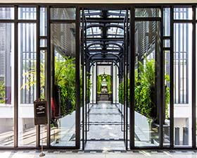 The luxurious and inviting entrance to the private residences at The Siam Hotel, Bangkok